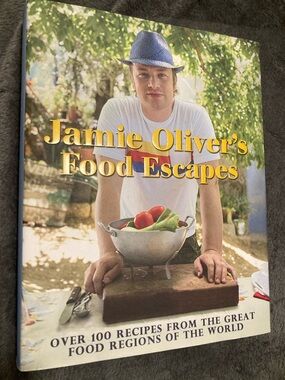 Jamie Oliver's Food Escapes Cookbook - White Cover with Yellow Title
